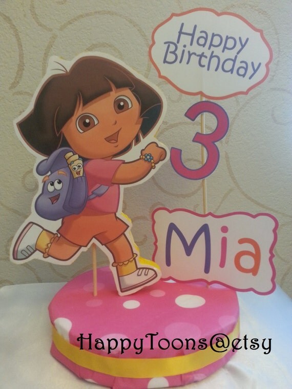 Items similar to Dora the Explorer personalized centerpiece on Etsy
