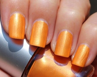 Sunet Franken Nail Polish - Bright orange color with gold shimmer