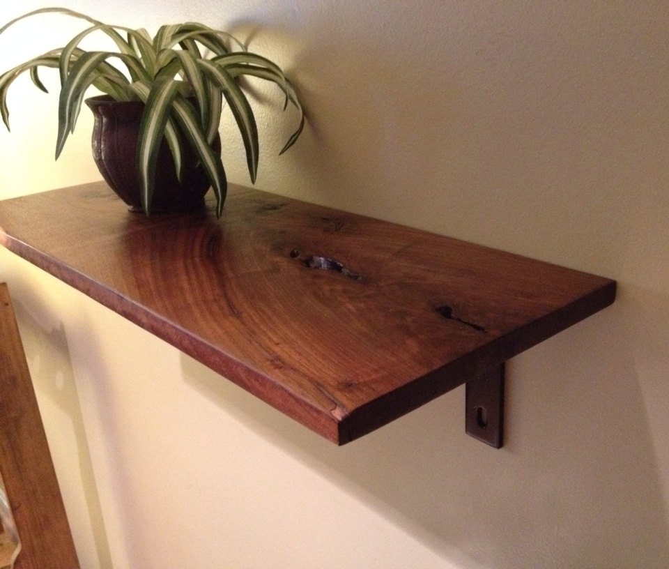 Reclaimed Raw Edge Walnut shelf w/ sleek steel brackets