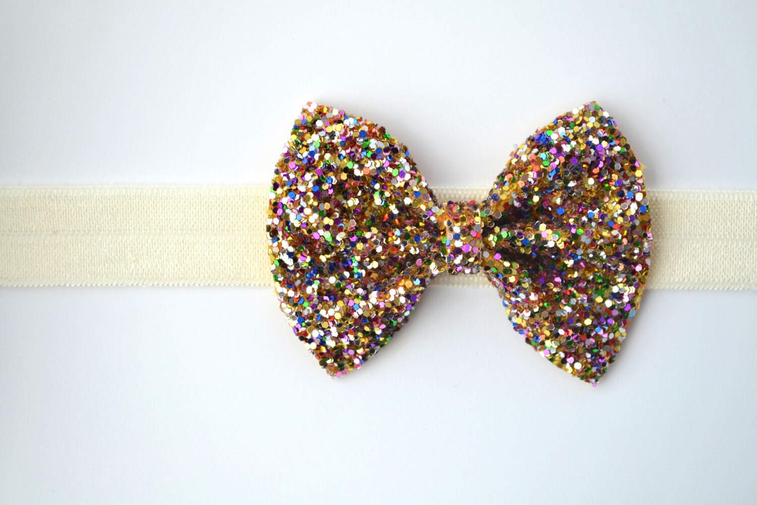 Multi Glitter Bow Headband on Ivory Elastic Baby Headband for