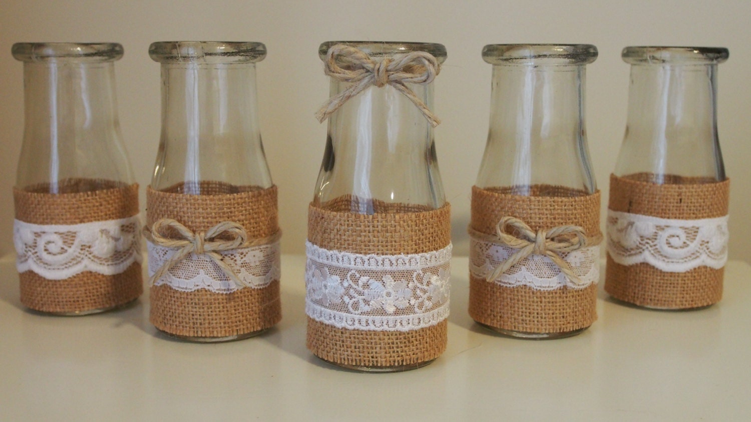 Rustic burlap / Hessian and lace mini milk bottle flower jars