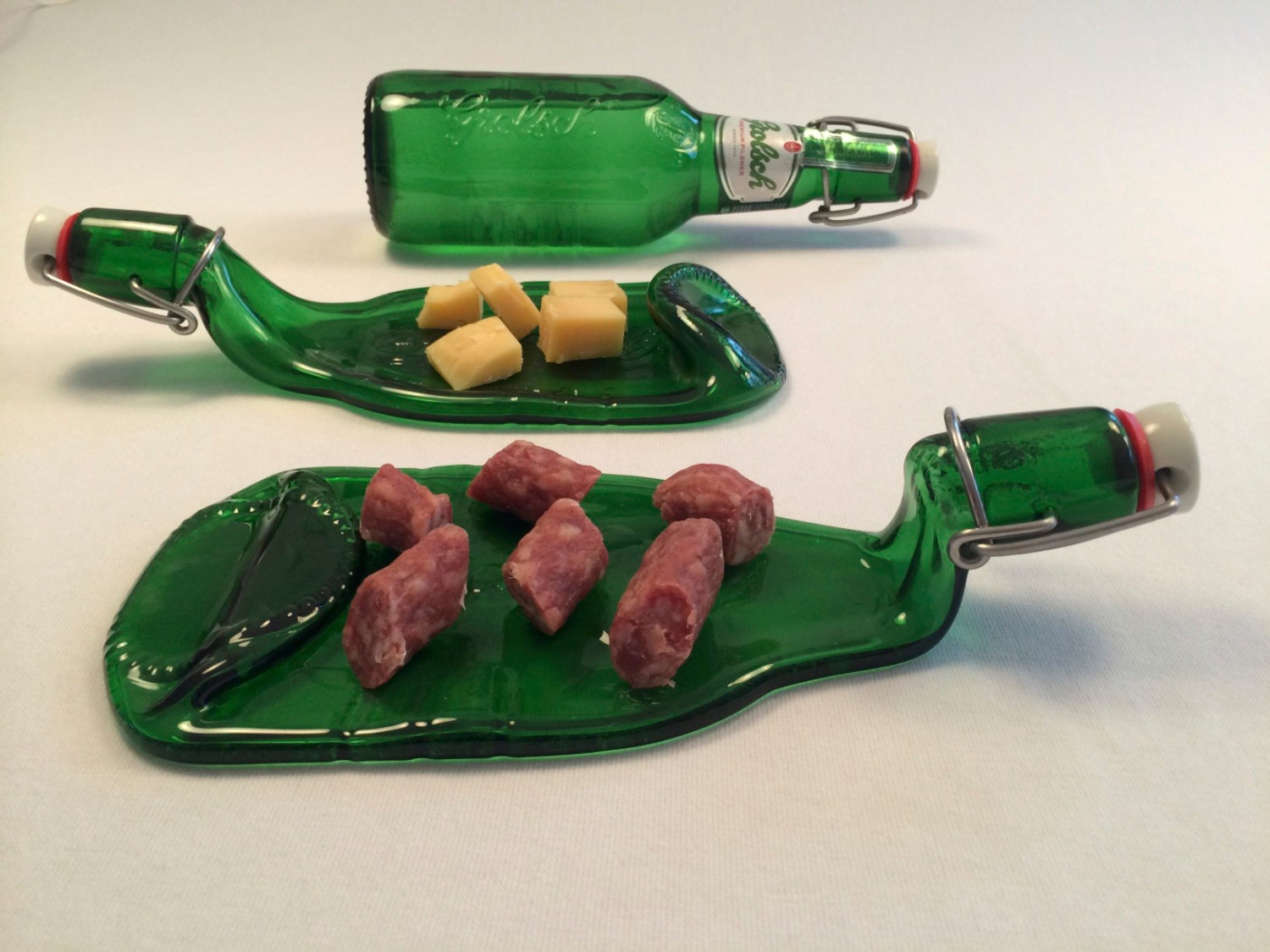 Gesmolten grolsch beugelfles kaasplank van glasarts op etsy