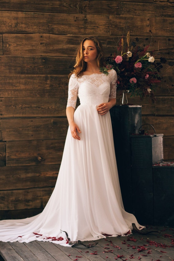 Off-white vintage inspired wedding dress with open back lace