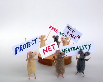 Protect NET neutrality. Miniature felt mouse on strike. Miniature animals fighting for the open internet.