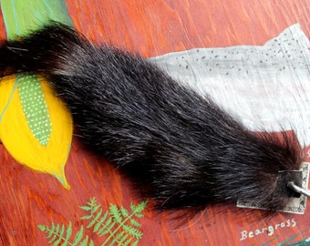 Popular items for skunk tail on Etsy