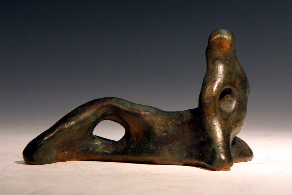 A BRONZE FIGURE OF A RECLINING NUDE , BY ENZO PLAZZOTTA (1921-1981) | Christies