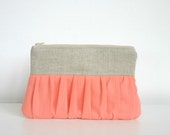 salmon pink clutch bag