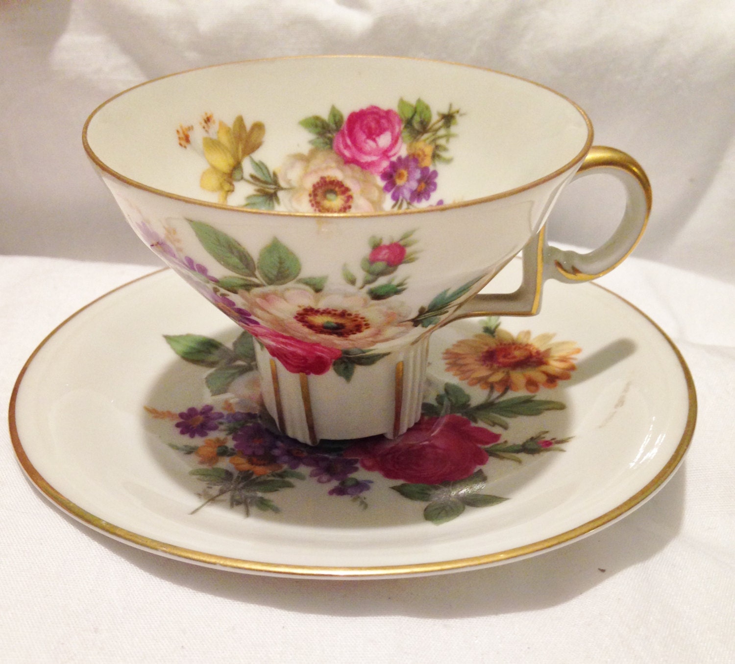Gold rimmed Floral Tea/Demi Cup and Saucer Haute Juice