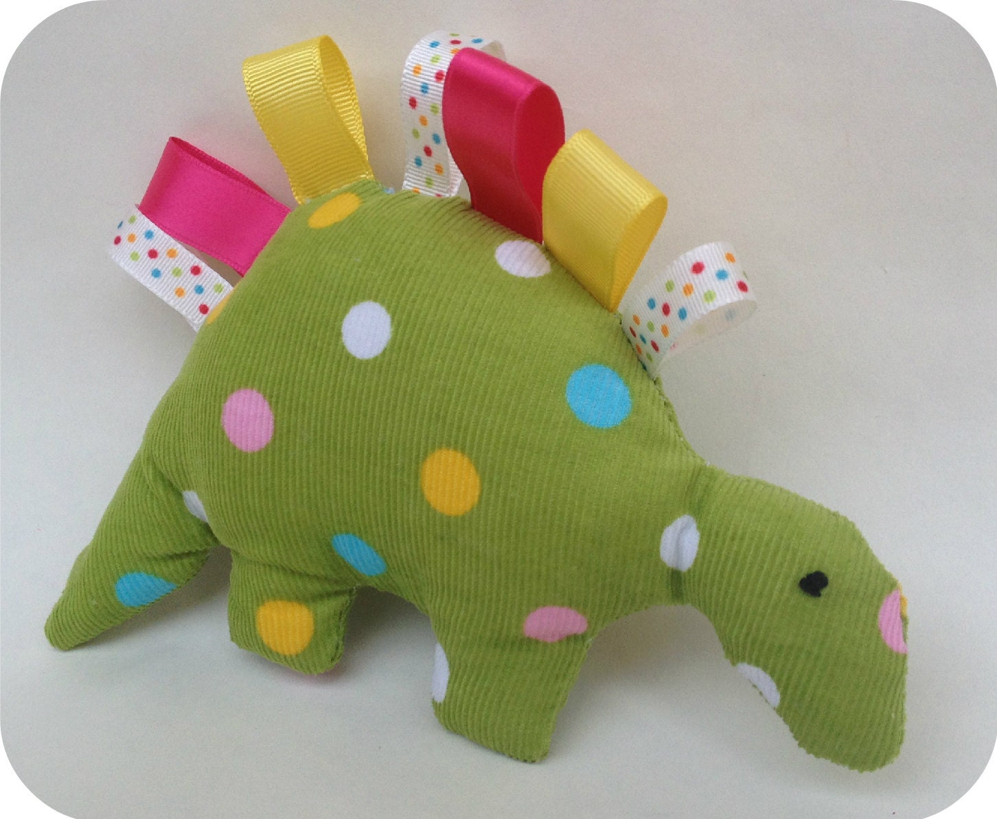 Corduroy dino taggie toy cuddle plush baby toy with ribbons