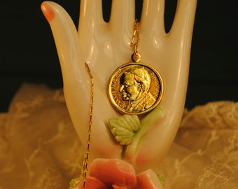 RELIGIOUS Wonderful Canadian Charm gold plated on chain sweet lovely and very beautiful please zoom in on photos for a closer look.no 141