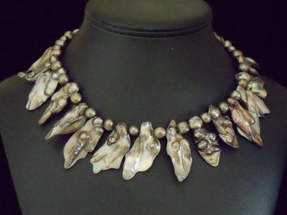 Baroque and freshwater pearl necklace with sterling extender and hook.