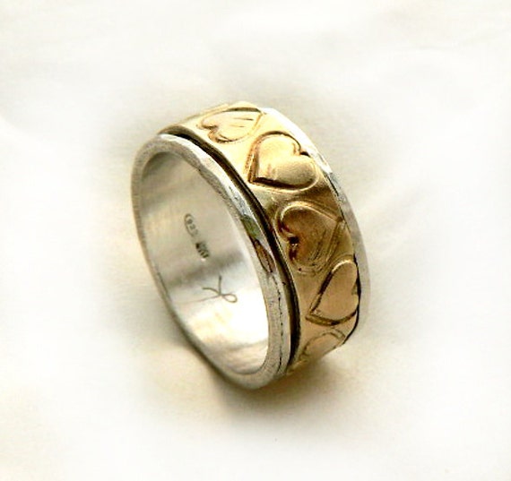 An unusual wedding ring sterling silver and gold heart ring with 9k ...