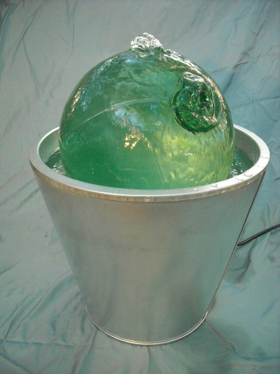 Outdoor fountain. Upcycled handblown glass gazing ball water