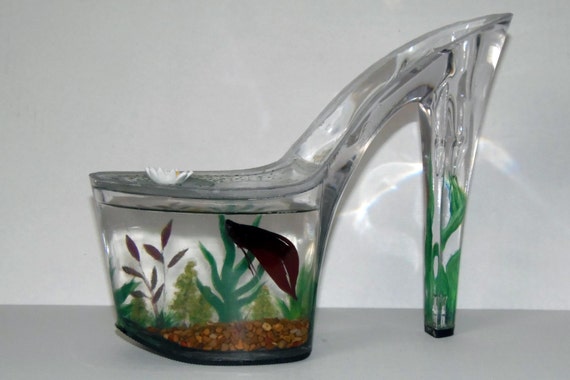 glass heels with fish