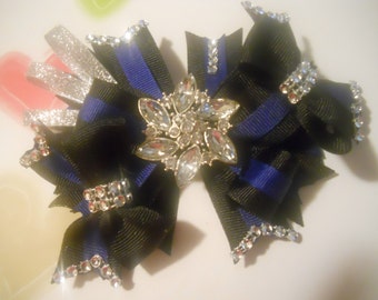 Large handmade thin blue line bow with tons of bling and sidebows
