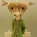 Hand Carved Wood Cowboy Caricature "Time for a New Hat"