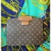 90s Vintage Louis Vuitton rare monogram shoulder purse. very chic and mod. Unisex