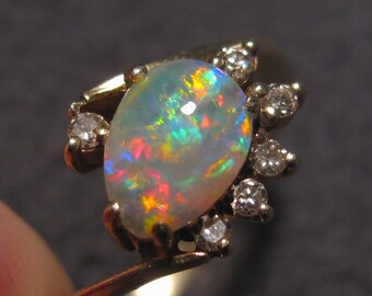 Opalized Wood Boulder Opal Fossil. Incredibly Rare by PlanetOpal