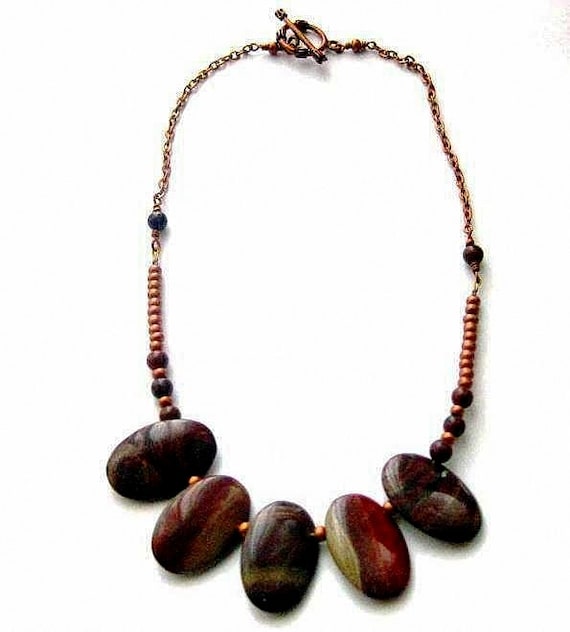 https://www.etsy.com/ie/listing/192562958/reserved-brown-stone-necklace-red-and?ref=shop_home_active_1