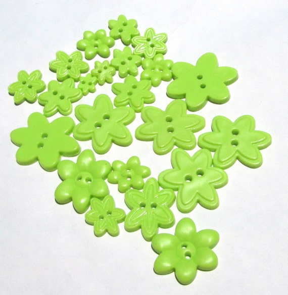 37 lime green flower shape plastic buttons in assorted sizes