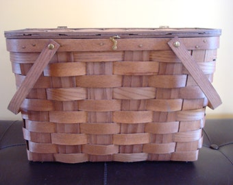 Very nice woven picnic basket with swing handles and hinged lid- Basketville, Vt.
