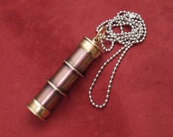 Steampunk accessories, stash necklace, lathe turned copper and brass.