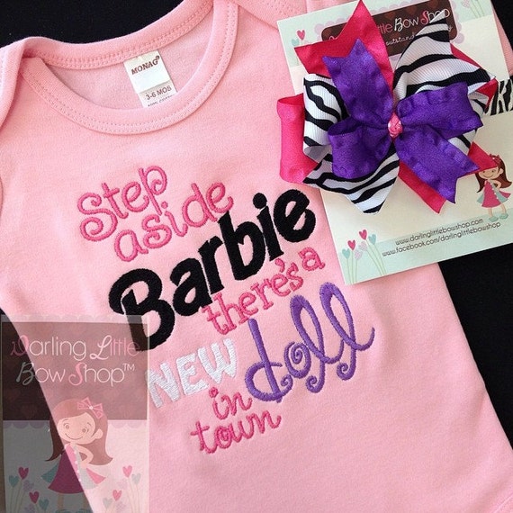 Baby Girl bodysuit and bow with headband there's a New