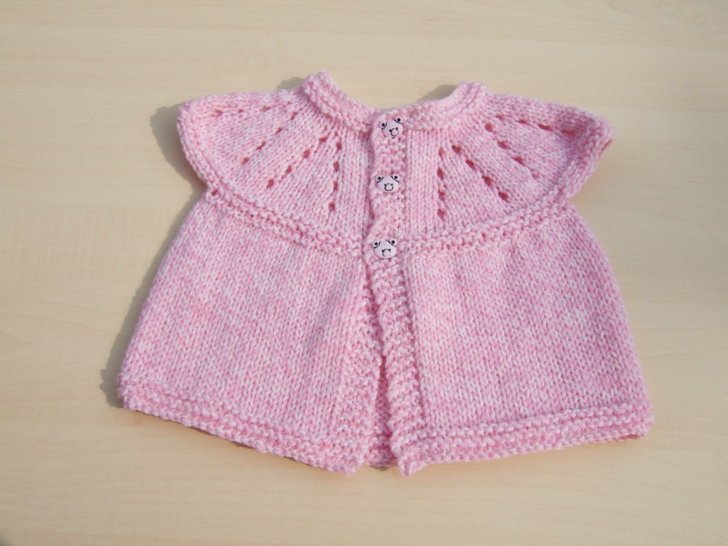 Baby sleeveless cardigan hand knitted in pink and cream mix