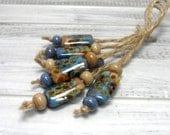 Lampwork.Glass bead handmade. Beads khaki, gray, brown, aquamarine, turquoise.