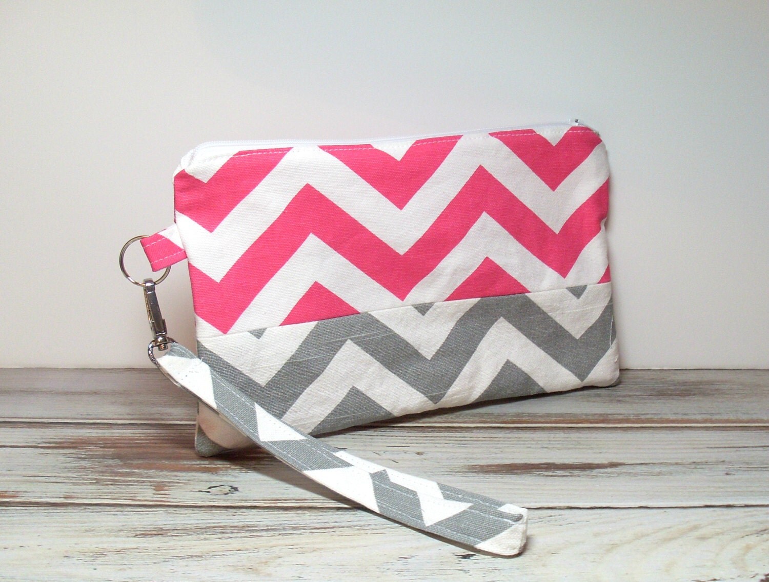 big pink clutch bag