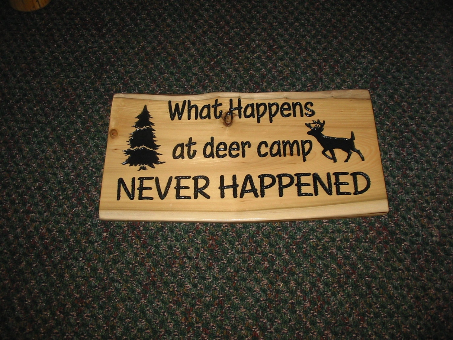 What Happens at Deer Camp Sign