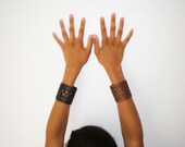 Cuff bracelet  in perforated genuine vegetable leather, black or brown