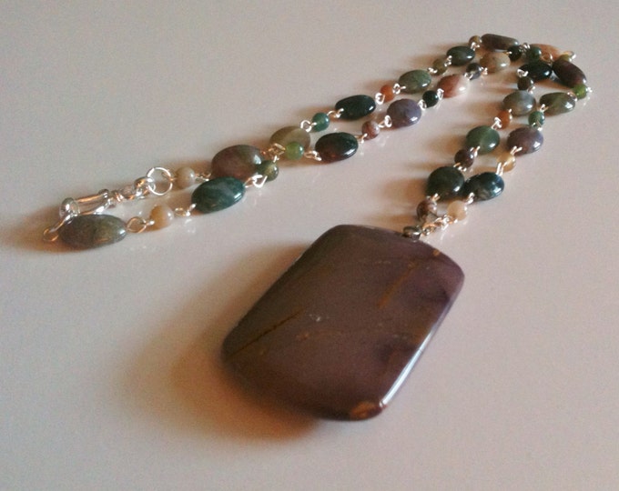 fancy jasper necklace with a purple stone pendant