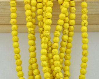 The lower wholesale prices--Two Full Strand---yellow Turquoise Round Beads----6mm\8mm ----about 120 Pieces------S0046