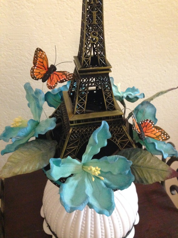 Eiffel Tower Centerpiece with butterflies and flowers for a