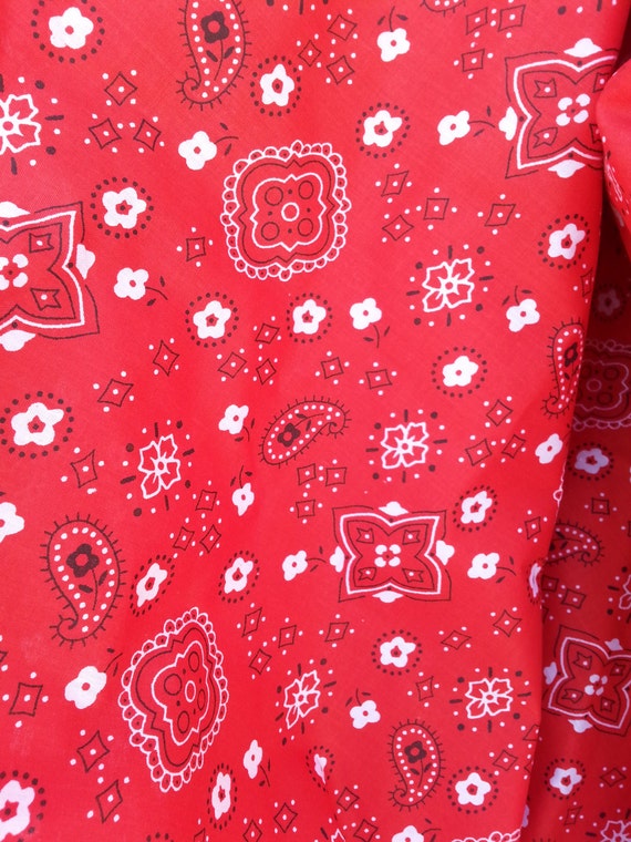 Red Bandana poly cotton fabric 58/59 wide. Sold