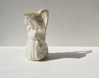 how to get putty off of porcelain figurine