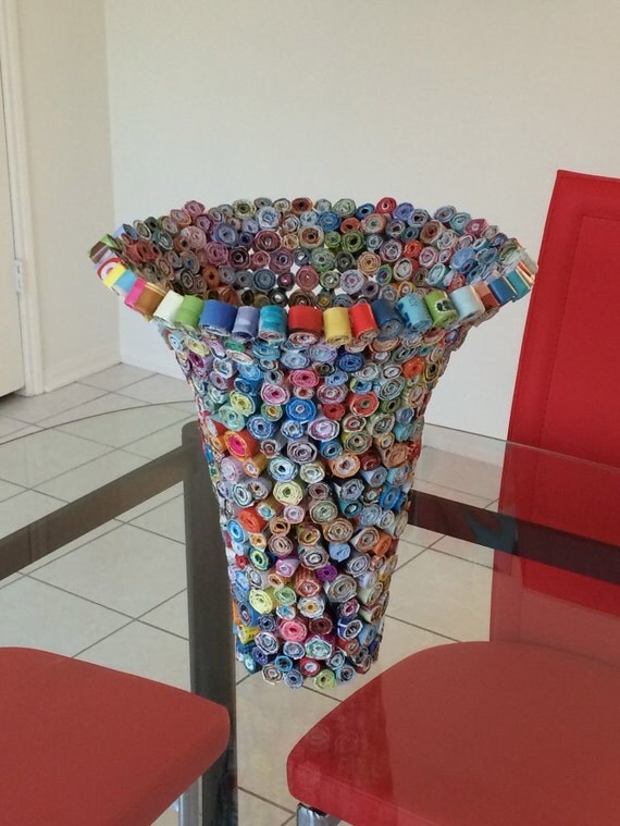 Multicolored vase made from magazines paper vase recycled