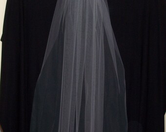 Fingertip length, single layer, cut edge veil for your special day!