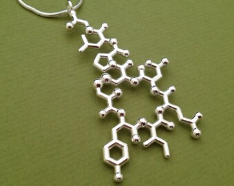 oxytocin necklace - dangling - trust, bonding, love - in solid sterling silver