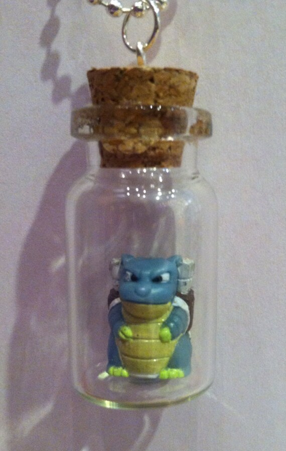 Items similar to Pokemon Game Piece in a Jar Necklace on Etsy