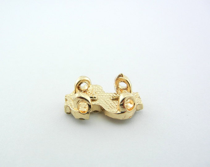 Small Gold-tone Dollar Four Link Charm with Rhinestones