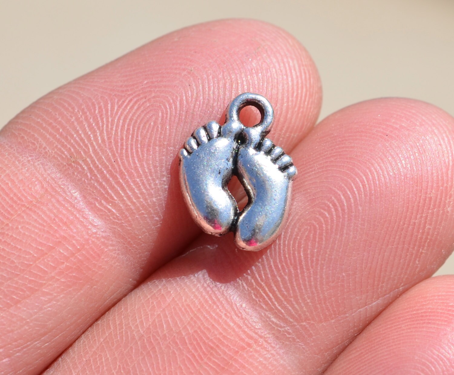 BULK 50 Little Silver Feet Charms SC1891