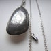 silver etched shell pendant by hybrid handmade Cari-Jane Hakes from 'Les Petites Callioux' series