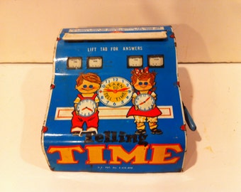 Vintage 1950's Metal Telling Time Toy