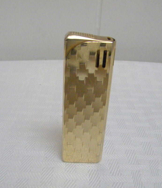 Flame Crest lighter in gold tone metal made in Japan 1960s