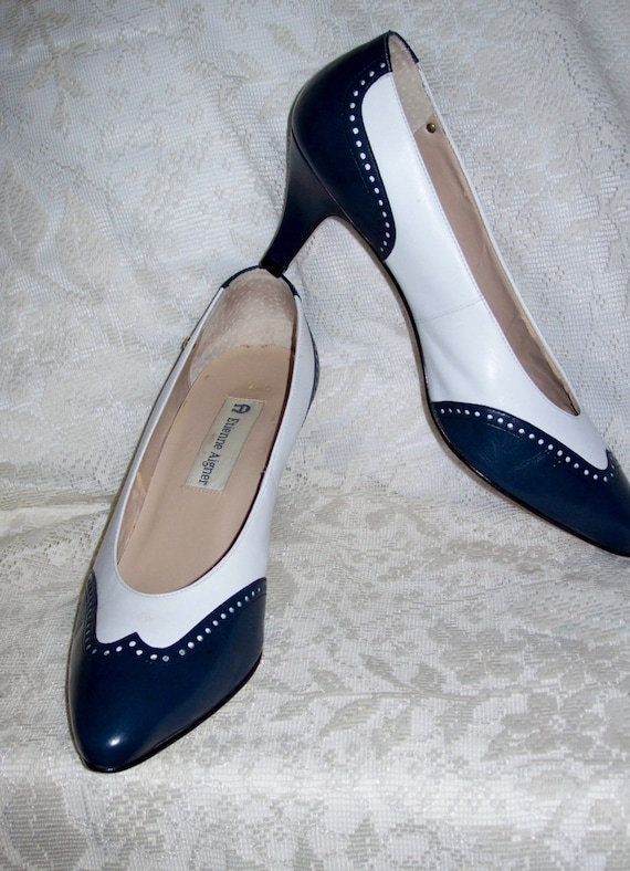 red and white spectator pumps