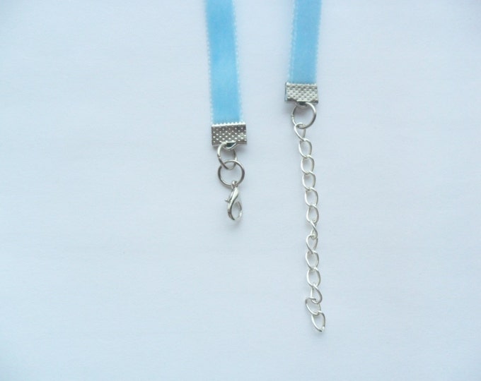 Velvet choker with baby blue plain ribbon adjustable with a width of 1/2” Ribbon Choker Necklace (pick your neck size)