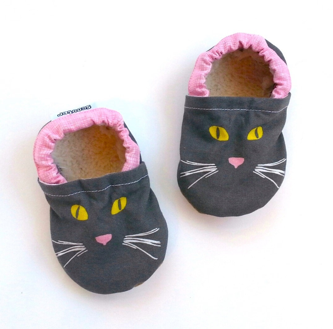 shoes with cat faces on them