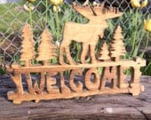 Moose welcome sign, rustic wooden cabin, lodge, or country home decor